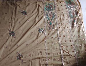 Elegant Beige Embellished Saree