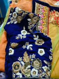 net embroidery saree with velvet blouse