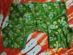 Green Brocade Blouse with Floral Motifs