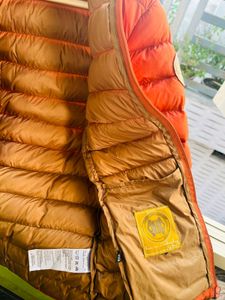 Orange puffer packable jacket