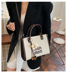 Stylish Taupe Tote Bag with Charm
