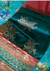 Stunning Red Embroidered Net Saree