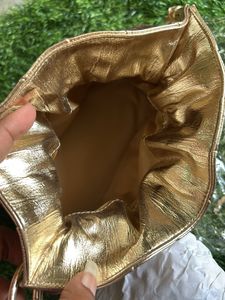 Estee Lauder Glamorous Gold Potli  Bag