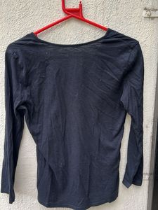 black casual top with embellished tiger imprint