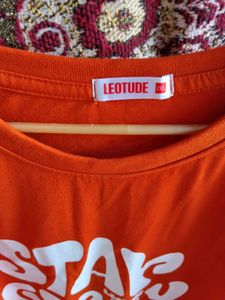 Orange "Stay Groovy" Graphic Tee