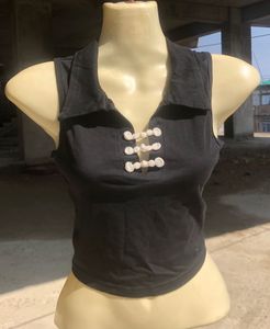 Elegant Black Blouse with White Trim