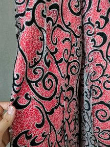 Glittery Red Gown With Black Detailing