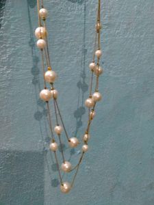 Pearl layer neckpiece
