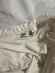 White Ruffle Bodysuit Top