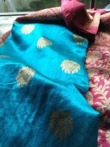 Elegant Teal and Maroon printed Saree.