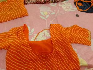 Vibrant Orange Leheriya Saree with blouse
