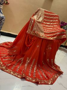 Vibrant Orange Sequined Saree