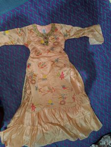Peach Embroidered long Aline type frock