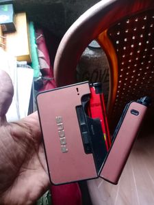 Cigarette Holder With Refillable Lighter