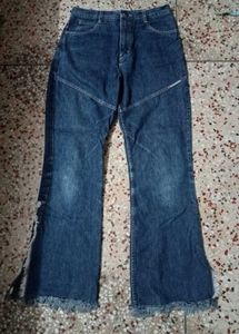 Flared Denim Jeans with Frayed Hem
