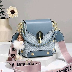Stylish Crossbody Bag with Charm