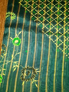 Teal Saree with Gold Print ,without blouse.
