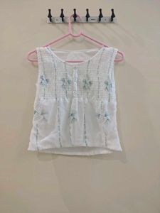 White Embroidered Sleeveless Blouse