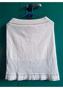Elegant White Knit Top with Embellished Neckline