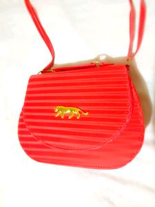 Red Stylish Striped Sling Bag....👛