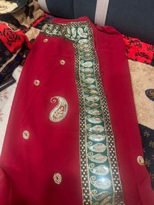 Elegant Red Saree with Paisley Embroidery