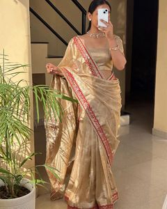 Elegant Golden Saree with Red Border