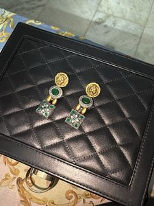 Sabyasachi look  Lion Head &amp; Emerald Earrings