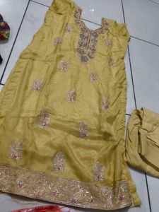 Elegant Yellow Kurta Set with Intricate Embroidery