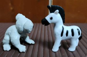 2 kinderjoy animal toys