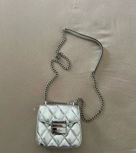 Kate Spade Silver Quilted Shoulder Bag