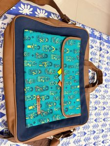 Turquoise Printed Laptop Bag- price negotiable