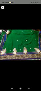 green party wear saree with stitched blouse