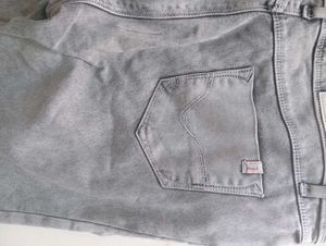 Red Cropped T-Shirt with Grey Jeans