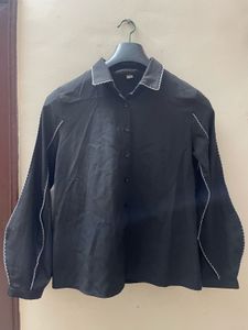 Black statement shirt with white detailing