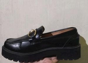 Classic Black Loafers with Gold Horsebit Detail