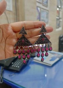 Designer drop earrings with pink stones