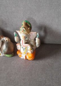 2 Lord Ganesha and one Balkrishna Idols