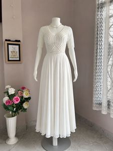 Elegant White Embellished Gown