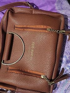 Sling Bag In Dark Brown Color Not Used New Item Very Spacious Have Multiple Sections