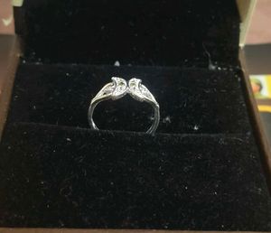Elegant Silver Ring with Green Stones