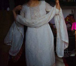Elegant White Kurta Set with Embellished Neckline