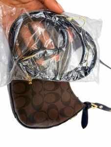 Coach Monogram Crescent Shoulder Bag