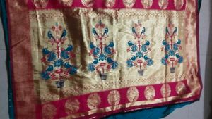 Beautiful Teal Saree with Pink Border