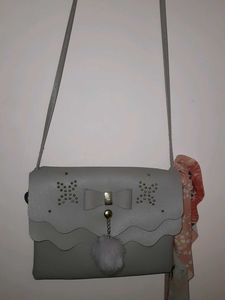 Grey Bow Detail Crossbody Bag with Pom Po