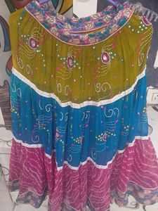 1) Royal Blue Lehenga Choli with Red Dupatta.  2)