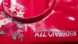 Red Patent Leather Handbag with Floral Embroidery