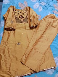 Elegant Yellow Kurta Set with Intricate Embroidery