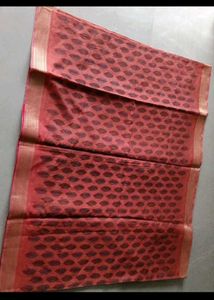 Beautiful Red Saree with Intricate Black Motifs