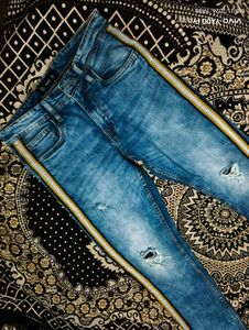 Distressed Blue Jeans with Side Stripe