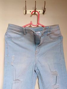 Light Wash Ripped Skinny Jeans